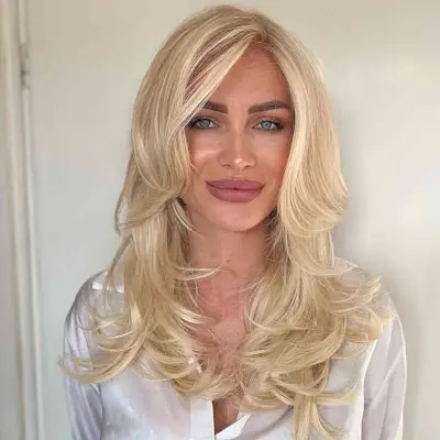 Straight Side-Parted Layers for women with mid-length blonde hair