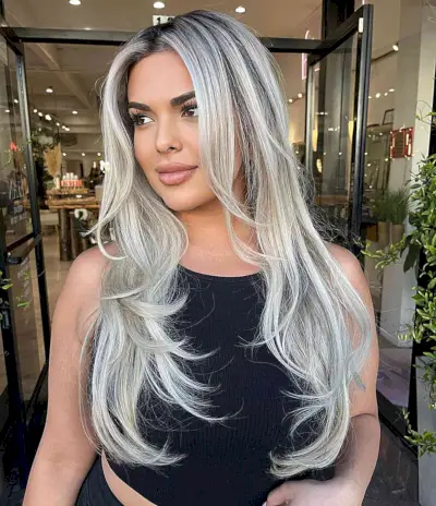 Platinum Blonde Long Layered Thin Hair with Dark Roots