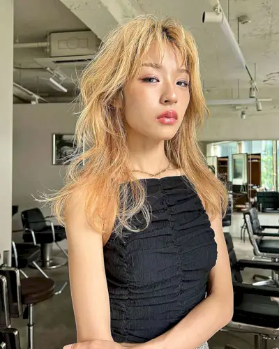 Mid-Long Textured Layer Cut with Messy Bangs for Thin Hair