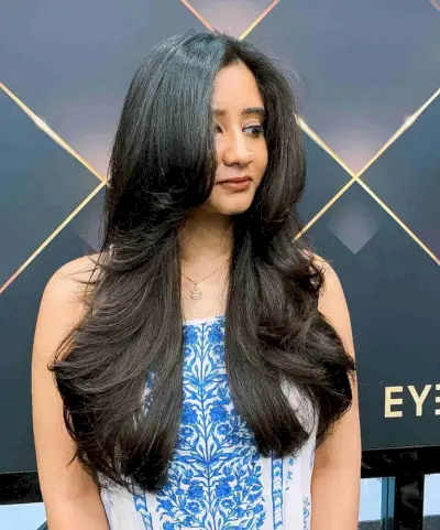 Side Part Layered Style for Long Thick Hair