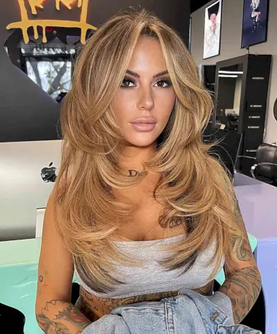 Very Long and Visible Front Layers for women with golden brown hair