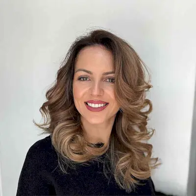 Chestnut Brown Wavy Layers for women with mid-length hair and a side part