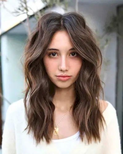 Mid-Length Layered Choppy Cut for Thick Hair