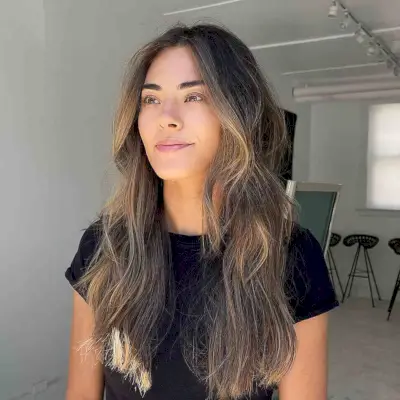 Beach Highlights on Long Choppy Layered Hair