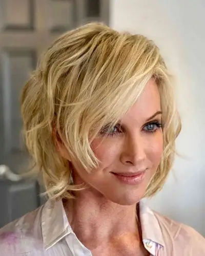 Blonde Balayage with Full Side Fringe and Choppy Layers