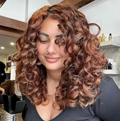 Thick Curly Hair with Hidden Layers for women with round faces