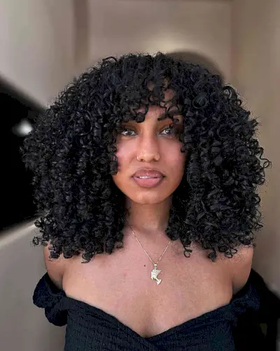 The Best Layered Curls for ladies with thick long curly hair