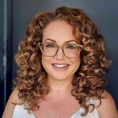 Textured Curls with Layers for women with thick curly hair and eyeglasses