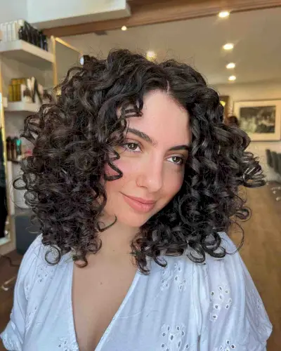 Stunning Dark Layered Curls with No Bangs