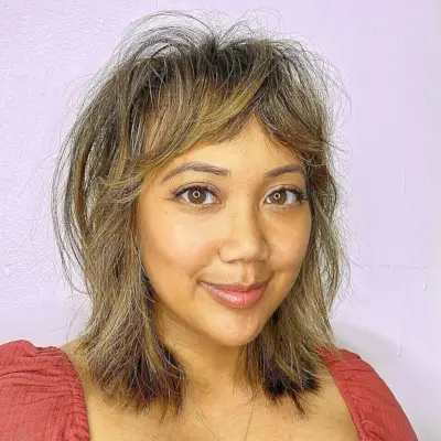 Shoulder-Length Layered Shag with Bangs for Thin Hair