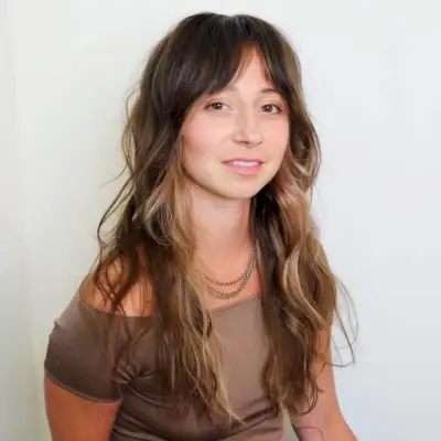 Long shag haircut with long curtain bangs