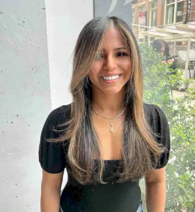 Long Thin Wispy Layers and Face-Framing Caramel Highlights