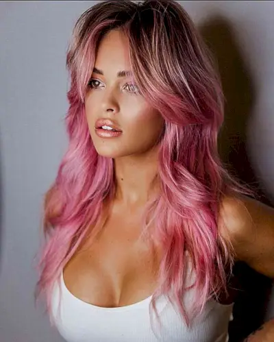 Long Pink Wolf Hair with Shaggy Layers and Curtain Bangs