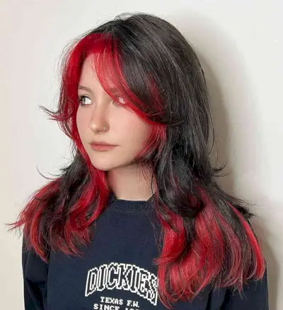 Long Black and Red Wolf Cut with Flipped Layers and Curtain Bangs