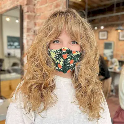 Tousled Curly Shaggy Layers with Curtain Bangs