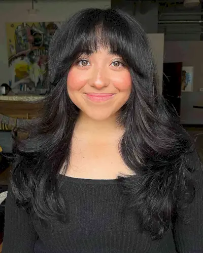 Long Thick Layered Hair and Bottleneck Bangs on Ladies with Rounder Faces