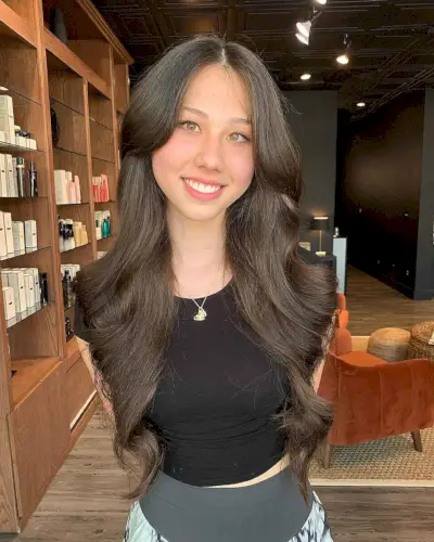 Waist-Length Sleek Hair for Ladies with Round Face Shapes