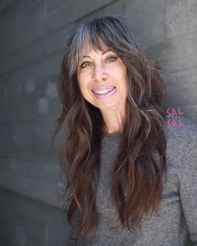 Effortless Long Shag with Grey Bangs and layers on women with long faces