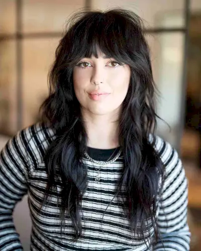 Long Shaggy Layers with Blunt Bangs