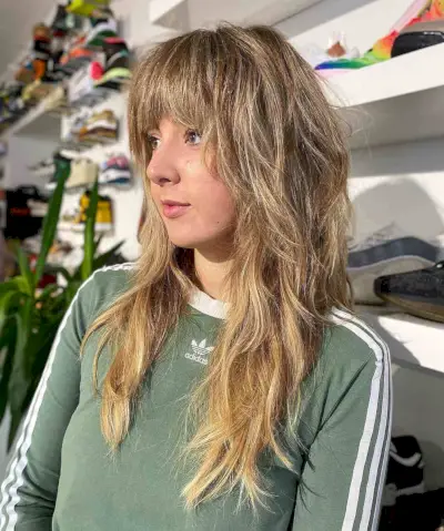 Long Tousled Shag Cut with Fringe Bangs