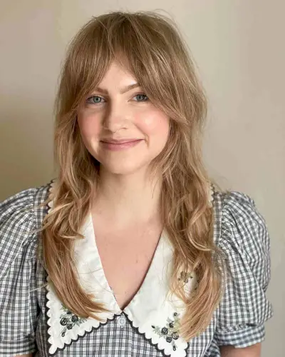 Long Low-Maintenance Shag with a Face Frame and Bangs