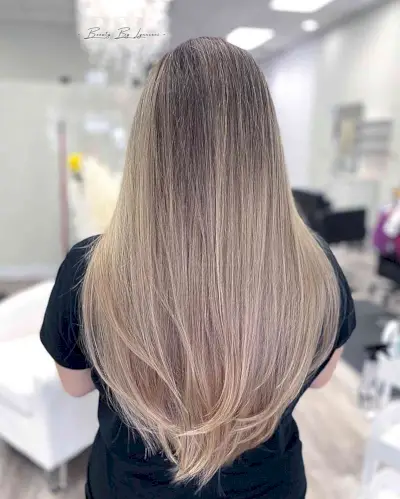 Long Wispy V-Cut with Soft Balayage and Shadow Root