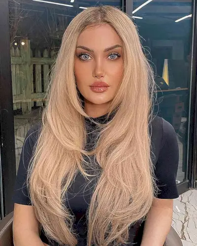 Extra Long Blonde Hair with Front Layers and a center part with wispy ends