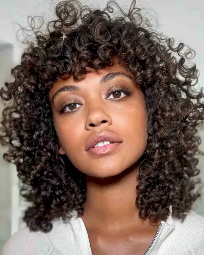 Healthy Naturally Curly Long Bob with Bangs