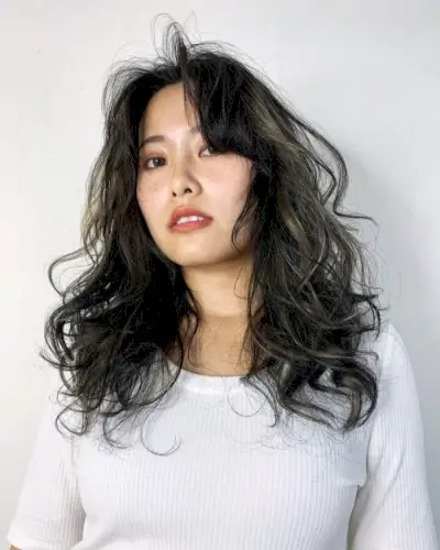 Super casual perm for long hair with bangs