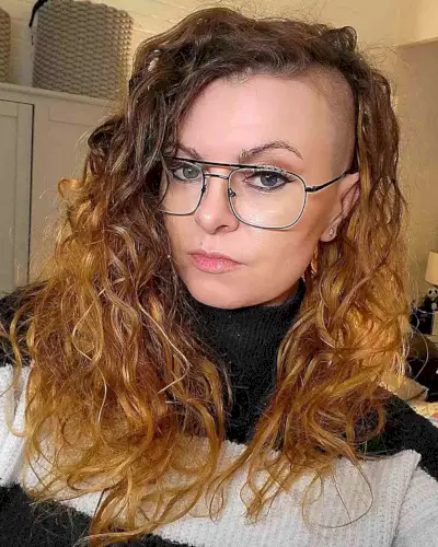 long natural hair with shaved sides