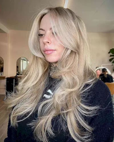 Creamy Blonde Hair with Long Feathered Butterfly Cut