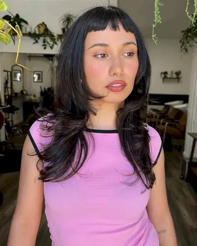 Long-Length Blowout Layered Feathered Hair with Short Bangs