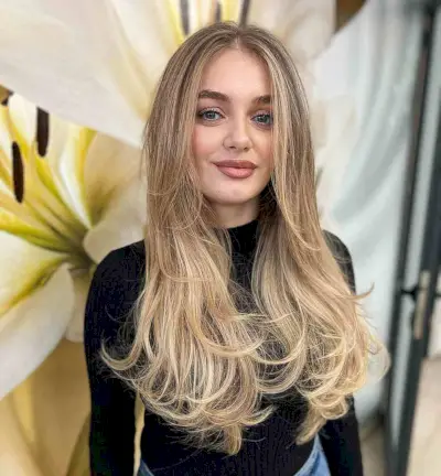 Long Middle-Parted Straight Layered Hairstyle