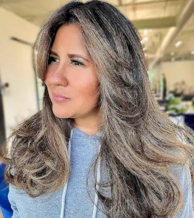 straight layered blowout for women over 40 with long hair