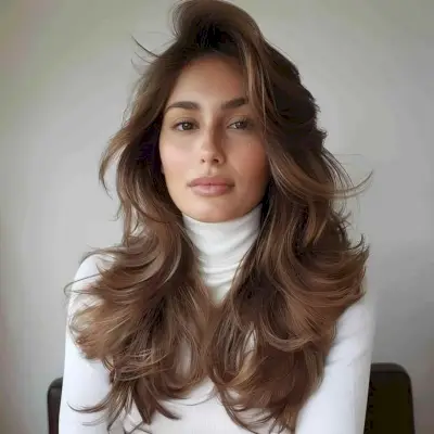 Alluring long straight shag with a side part