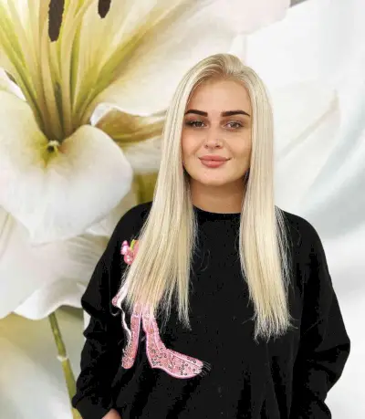 Long Light Blonde Hairstyle with a Side Part