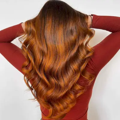 dark brown long layered haircut with a bright balayage