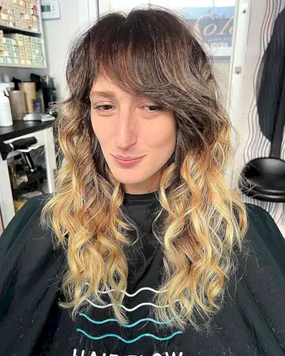 Eye-Catching Long Wavy Hair with Side Bangs