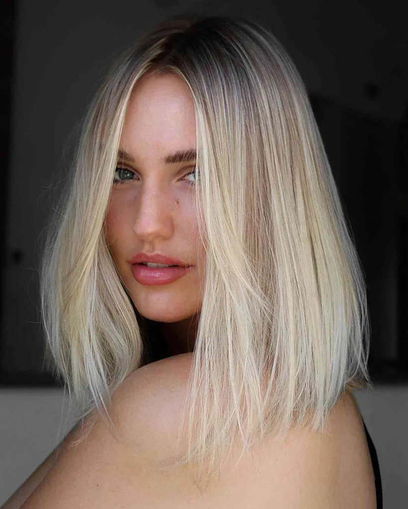 Platinum Blonde Shadow Root Shoulder Lengths' title=