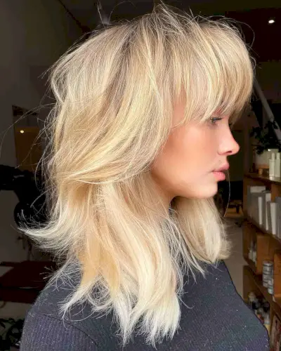 Medium-Length Textured Shag with Big Bangs