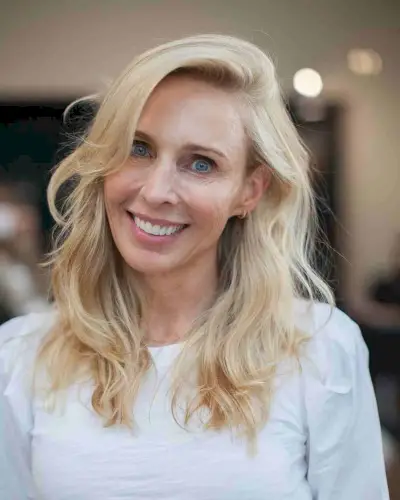 Medium Layered Cut with a Deep Side Part and Side Fringe on Fine Hair