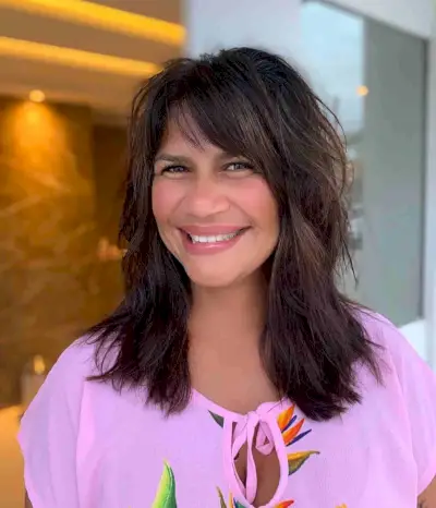 Mid-Length Multi-Layered Shag with Wispy Side Bangs