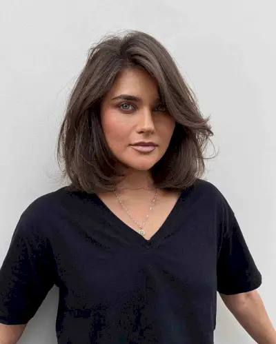 Medium-Length Natural Brunette Soft Layers and Side Bangs