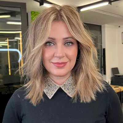 Medium-Length Choppy Balayage with a middle part