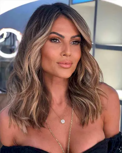 Medium Choppy Brown Balayage with a Side Part