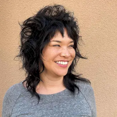 Short Textured Layers on a Mid-Length Wolf Cut