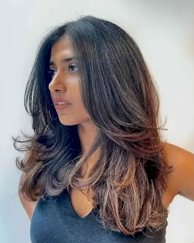 Thick Voluminous Medium Hair with Long, Flipped Layers on Dark Hair