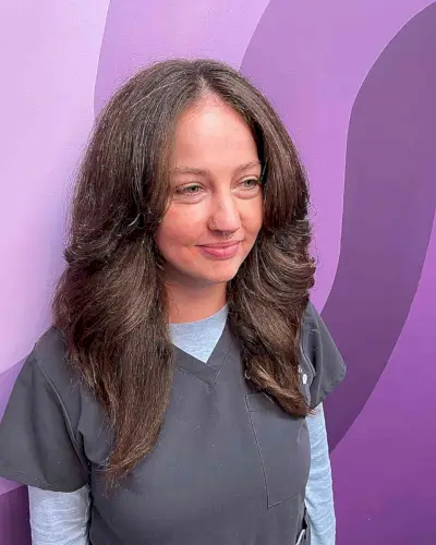 Blow-Out Shag on Thick Medium-Length Brunette Hair for Women with Long Faces