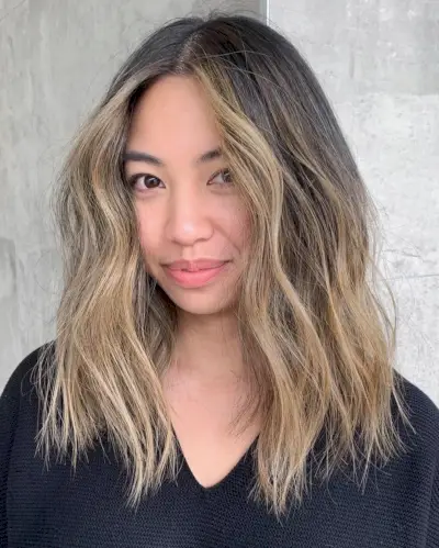 Lived-In Layered Cut for Wavy Mid-Length Thick Hair