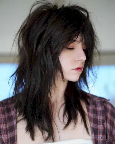 Undone mid-length shag with layers for thick tresses